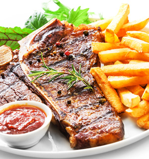 Steak Served with Crisp Golden French Fries Steak Served with Crisp Golden French Fries